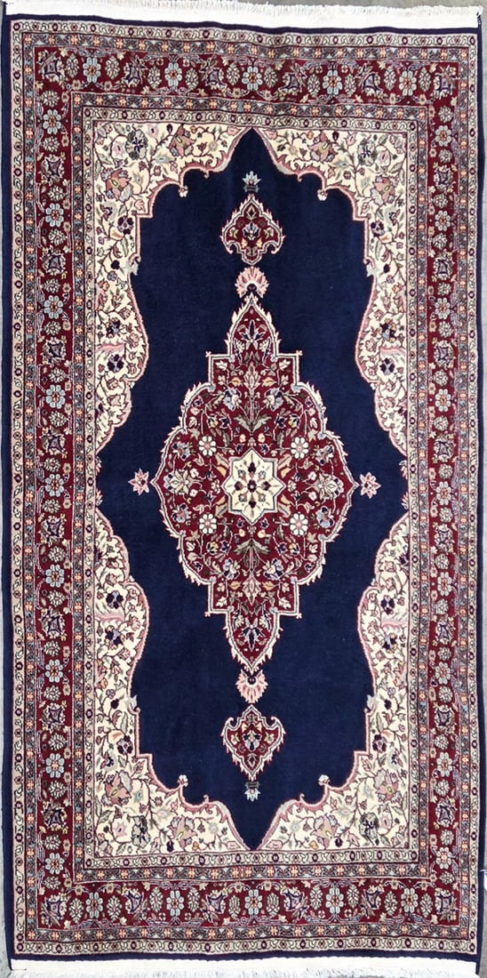Ladik - Medallioni Area Rug, 4'-6" X 6'-10": Size: 4'-6" X 6'-10" Country of Origin: TUR Color: DB Border: CRE Advertised Retail Price: $ 1900 Tag No. 10502