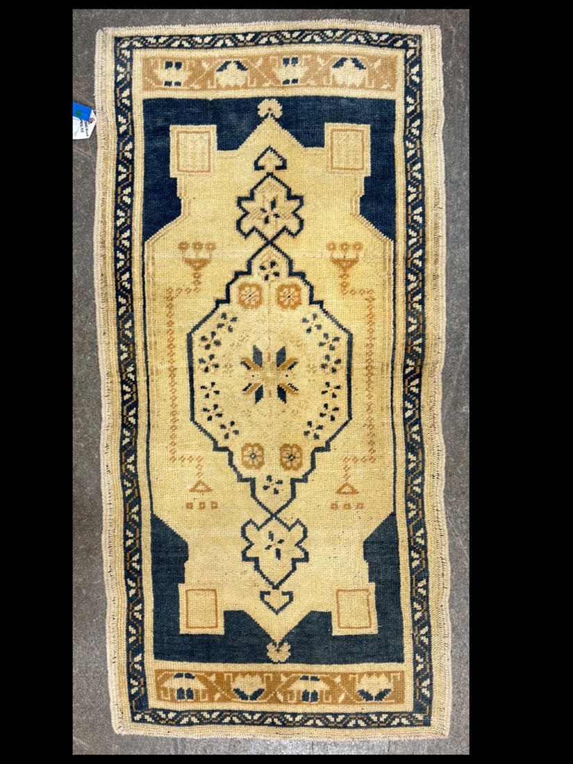 Vintage-Yasti Accent Rug, 1'-10" X 3'-11": Size: 1'-10" X 3'-11" Country of Origin: TUR Color: GLD Border: NAV Advertised Retail Price: $ 480 Tag No. 12141