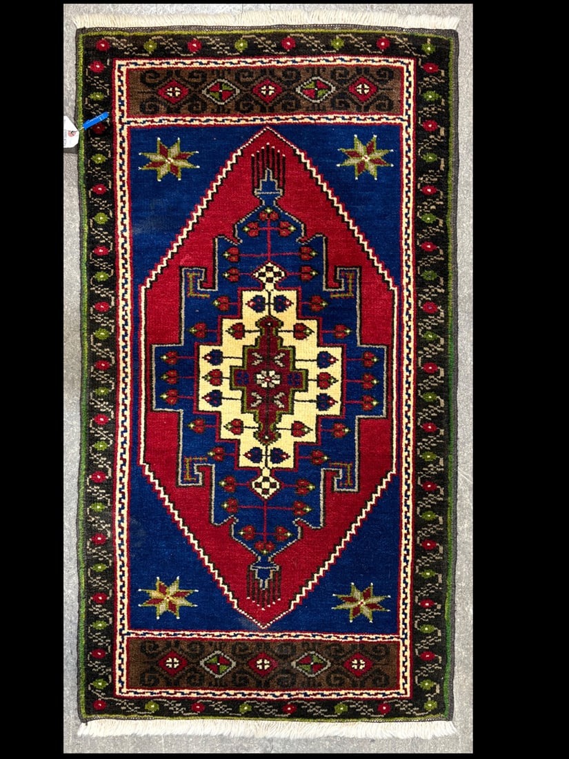 Konya-Yastik Accent Rug, 1'-10" X 3'-4": Size: 1'-10" X 3'-4" Country of Origin: TUR Color: MLT Border: NAV Advertised Retail Price: $ 330 Tag No. 12153