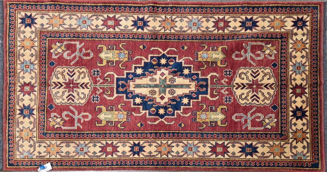Superkazak-G Runner, 3'-11" X 6'-2": Size: 3'-11" X 6'-2" Country of Origin: TRK Color: RUS Border: IVR Advertised Retail Price: $ 1650 Tag No. 12548 Shipping available. 