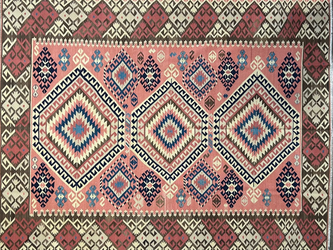 Konyakilim-K Area Rug, 8'-2" X 10'-3": Size: 8'-2" X 10'-3" Country of Origin: TUR Color: SKM Border: MLT Advertised Retail Price: $ 3495 Tag No. 11996 Shipping available. 