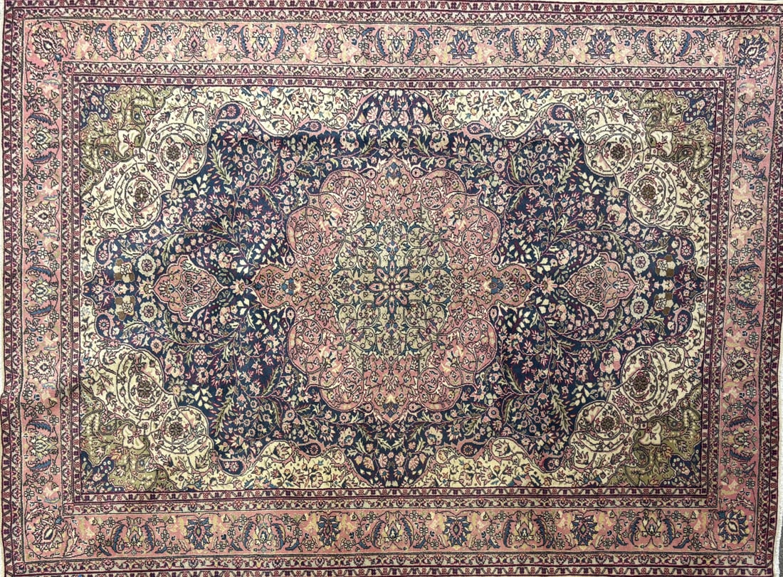Ladik - Medallioni Area Rug, 6'-9" X 9'-5": Size: 6'-9" X 9'-5" Country of Origin: TUR Color: DB Border: SKM Advertised Retail Price: $ 2750 Tag No. 10496 Shipping available. 