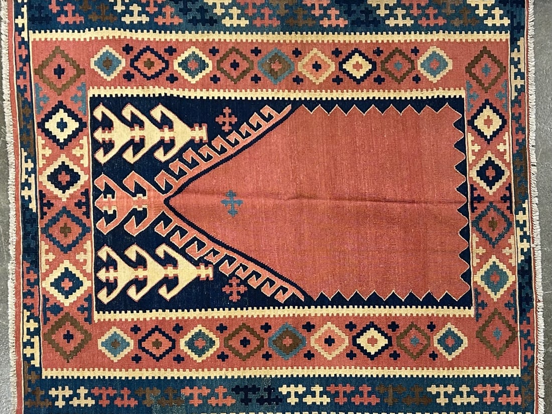 Konyakilim-K Area Rug, 5'-9" X 6'-3": Size: 5'-9" X 6'-3" Country of Origin: TUR Color: SKM Border: BLU Advertised Retail Price: $ 1750 Tag No. 12024 Shipping available. 
