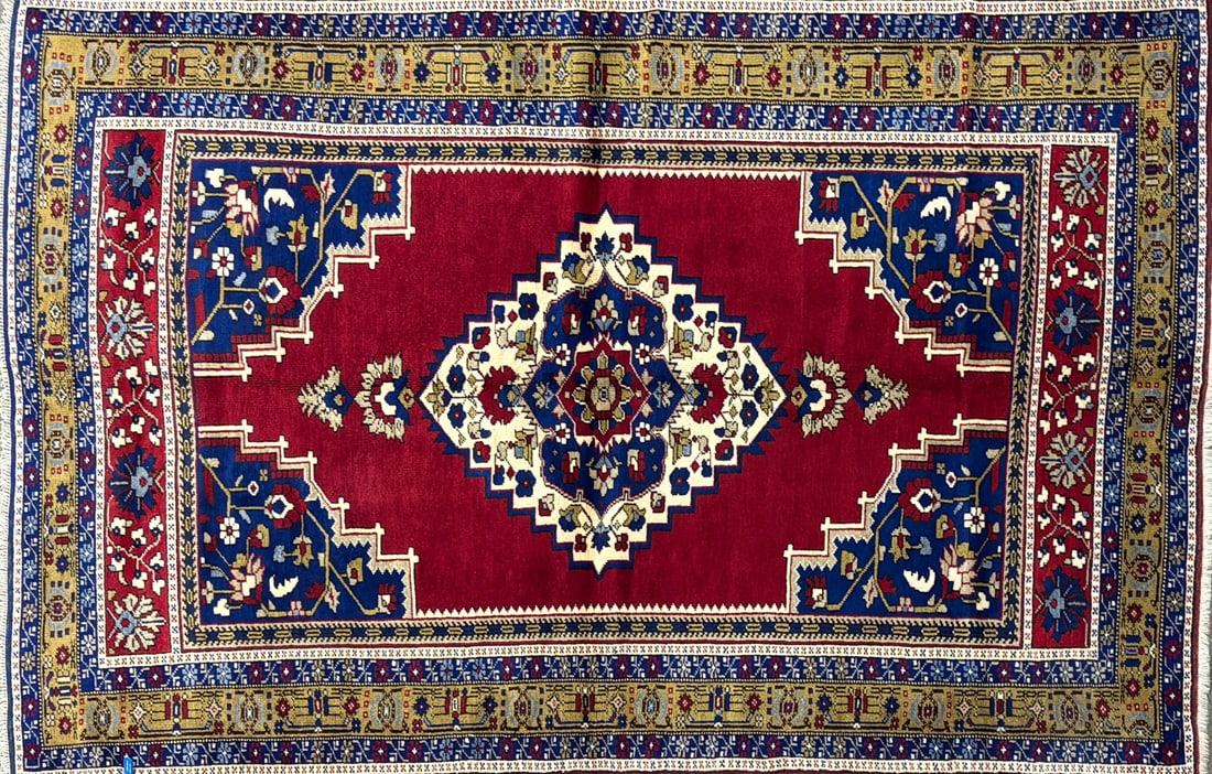 Tashpinar - Medallion Area Rug, 5'-5" X 8'-2": Size: 5'-5" X 8'-2" Country of Origin: TUR Color: BRN Border: ORG Advertised Retail Price: $ 3650 Tag No. 11778 Shipping available. 