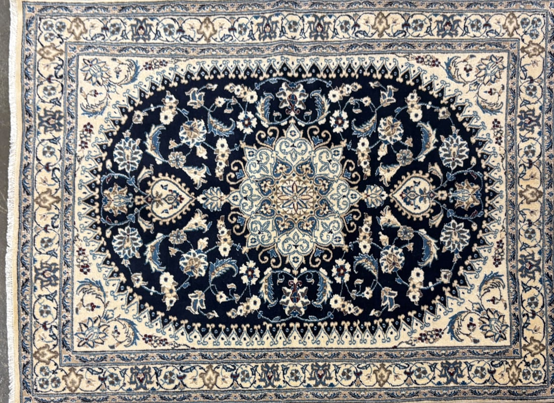 Nain- Area Rug, 4'-8" X 6'-3": Size: 4'-8" X 6'-3" Country of Origin: IR Color: BLU Border: IVR Advertised Retail Price: $ 2040 Tag No. 13015 Shipping available.