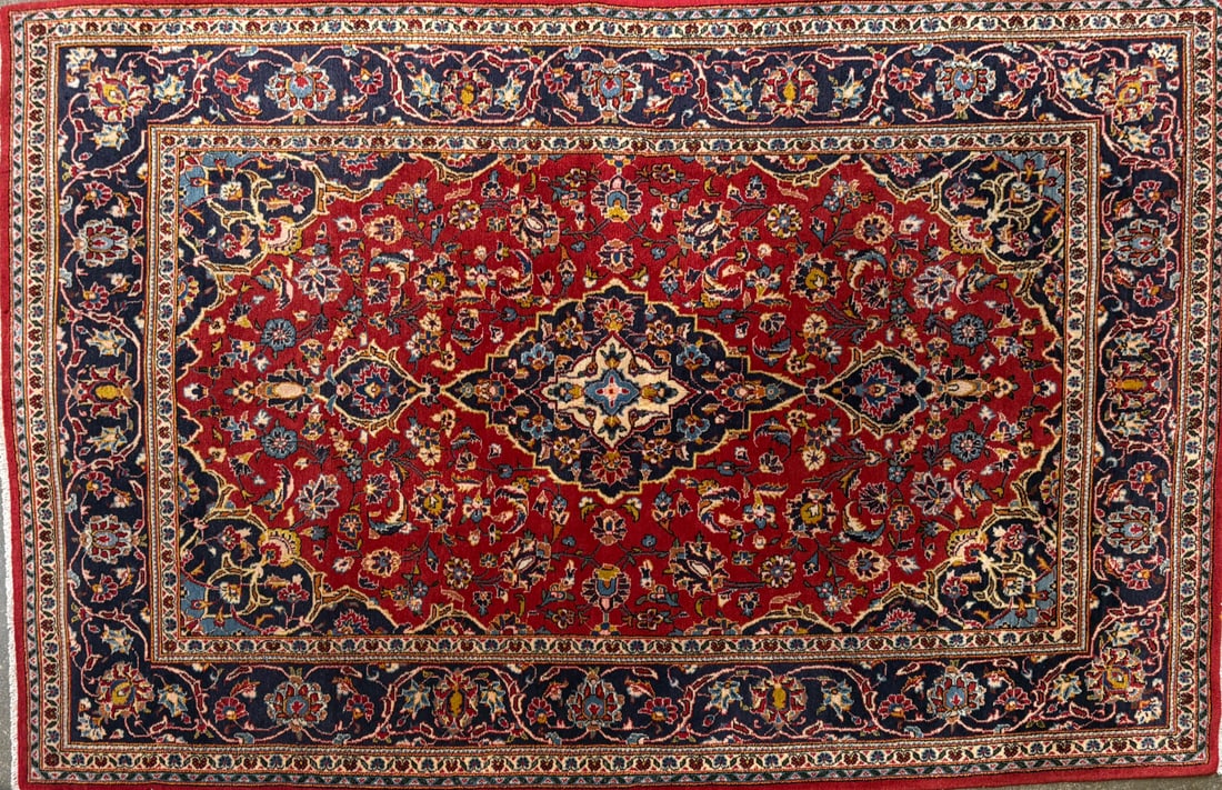 Kashan- Area Rug, 4'-6" X 7'-4": Size: 4'-6" X 7'-4" Country of Origin: IR Advertised Retail Price: $ 2640 Tag No. 13733 Shipping available.