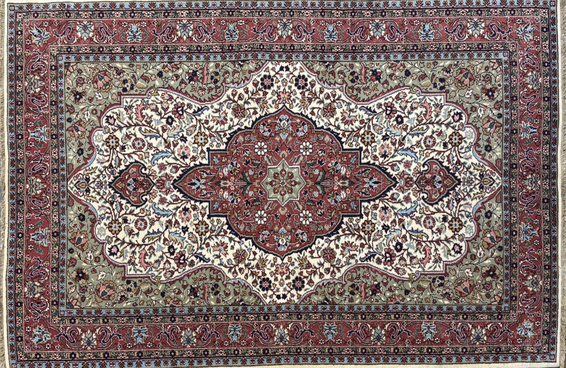 Ladik - Medallioni Area Rug, 4'-6" X 6'-8": Size: 4'-6" X 6'-8" Country of Origin: TUR Color: IVR Border: SIE Advertised Retail Price: $ 1800 Tag No. 10499 Shipping available.