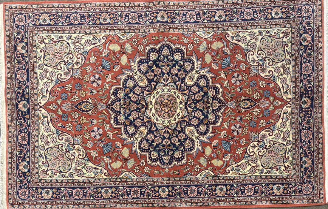 Ladik - Medallioni Area Rug, 4'-5" X 6'-10": Size: 4'-5" X 6'-10" Country of Origin: TUR Color: ORG Border: BLU Advertised Retail Price: $ 1800 Tag No. 10503 Shipping available.