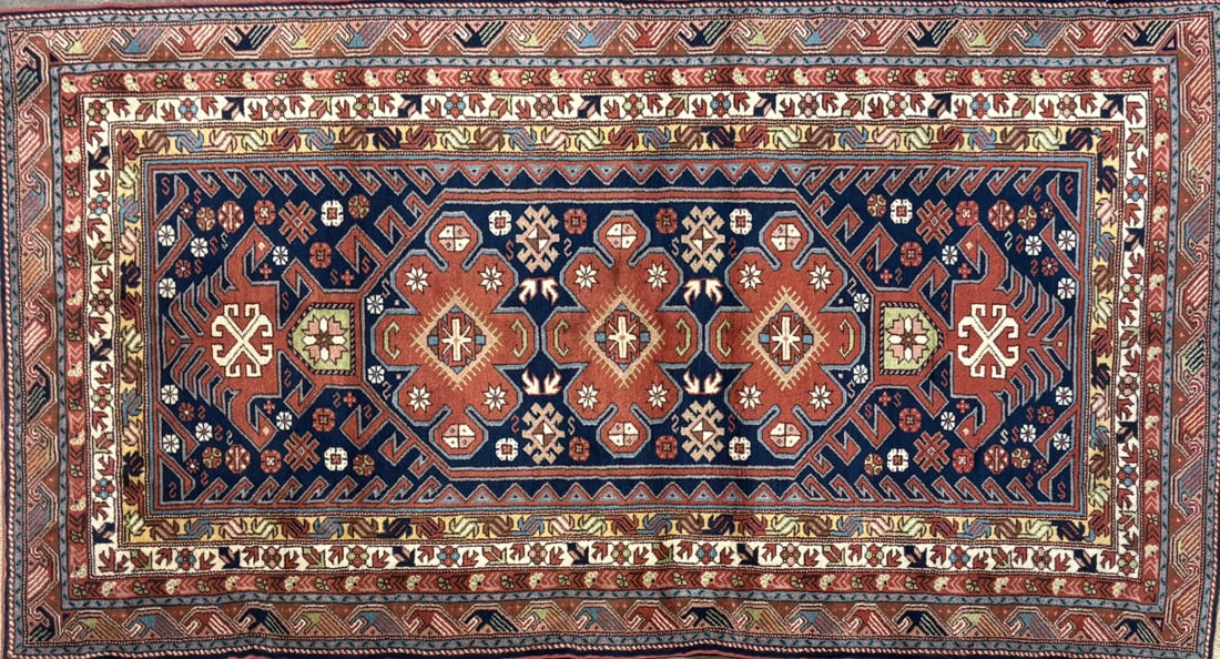 Konya - Geometric Area Rug, 4'-4" X 8'-4": Size: 4'-4" X 8'-4" Country of Origin: TUR Color: NAV Border: MLT Advertised Retail Price: $ 3605 Tag No. 11552 Shipping available.