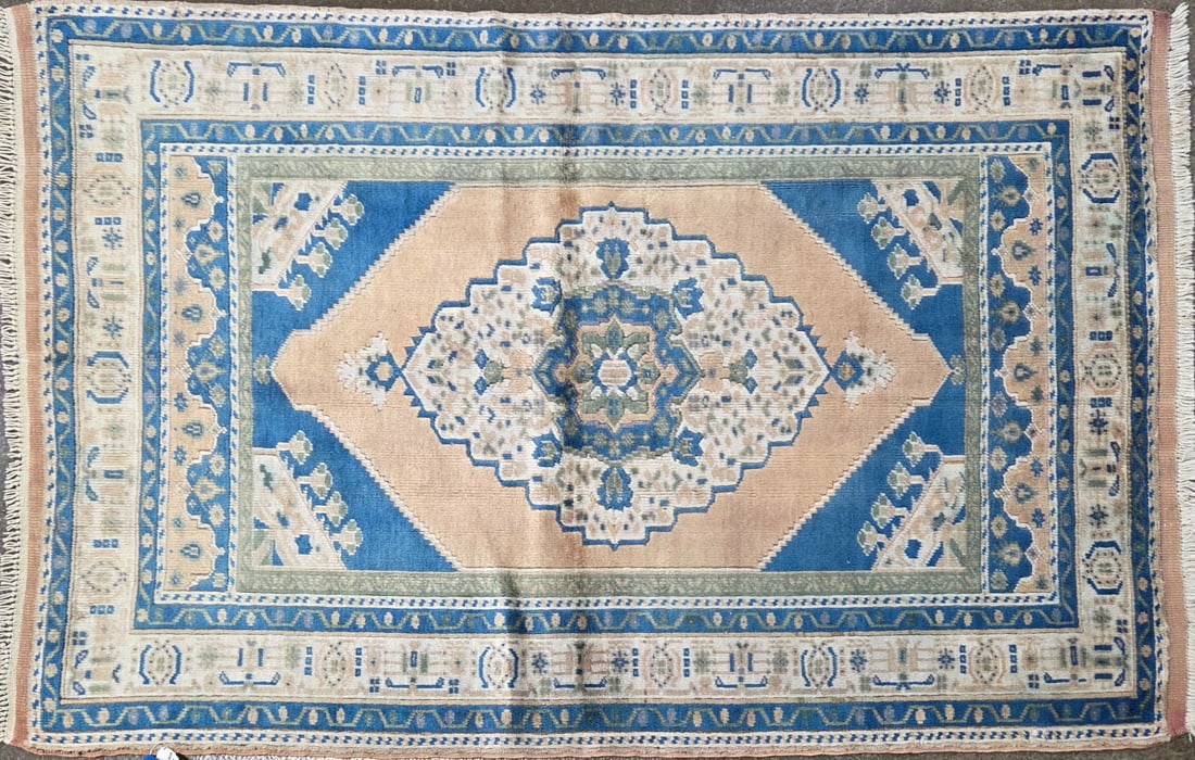 Tashpinar - Medallion Area Rug, 4'-3" X 5'-3": Size: 4'-3" X 5'-3" Country of Origin: TUR Color: SKM Border: TAN Advertised Retail Price: $ 1350 Tag No. 11672 Shipping available.