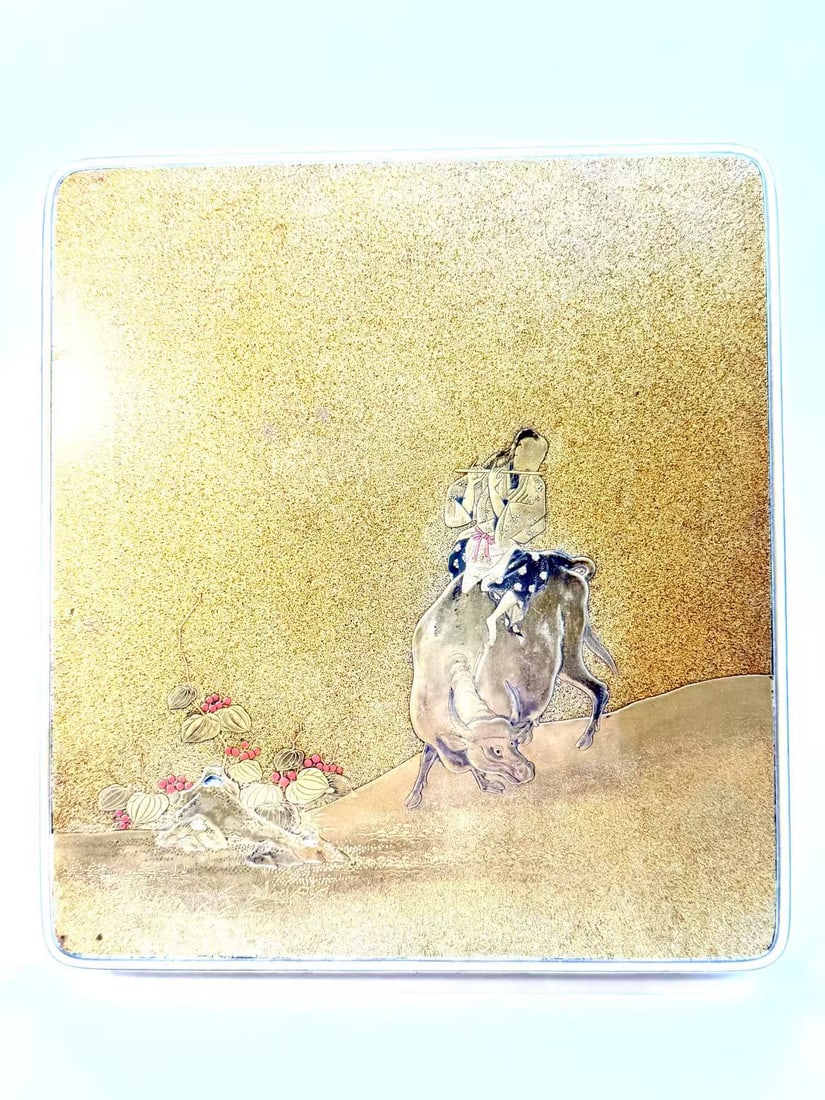 Meiji period Japanese lacquer box with gold painting of boy riding on ox (1 of 5)