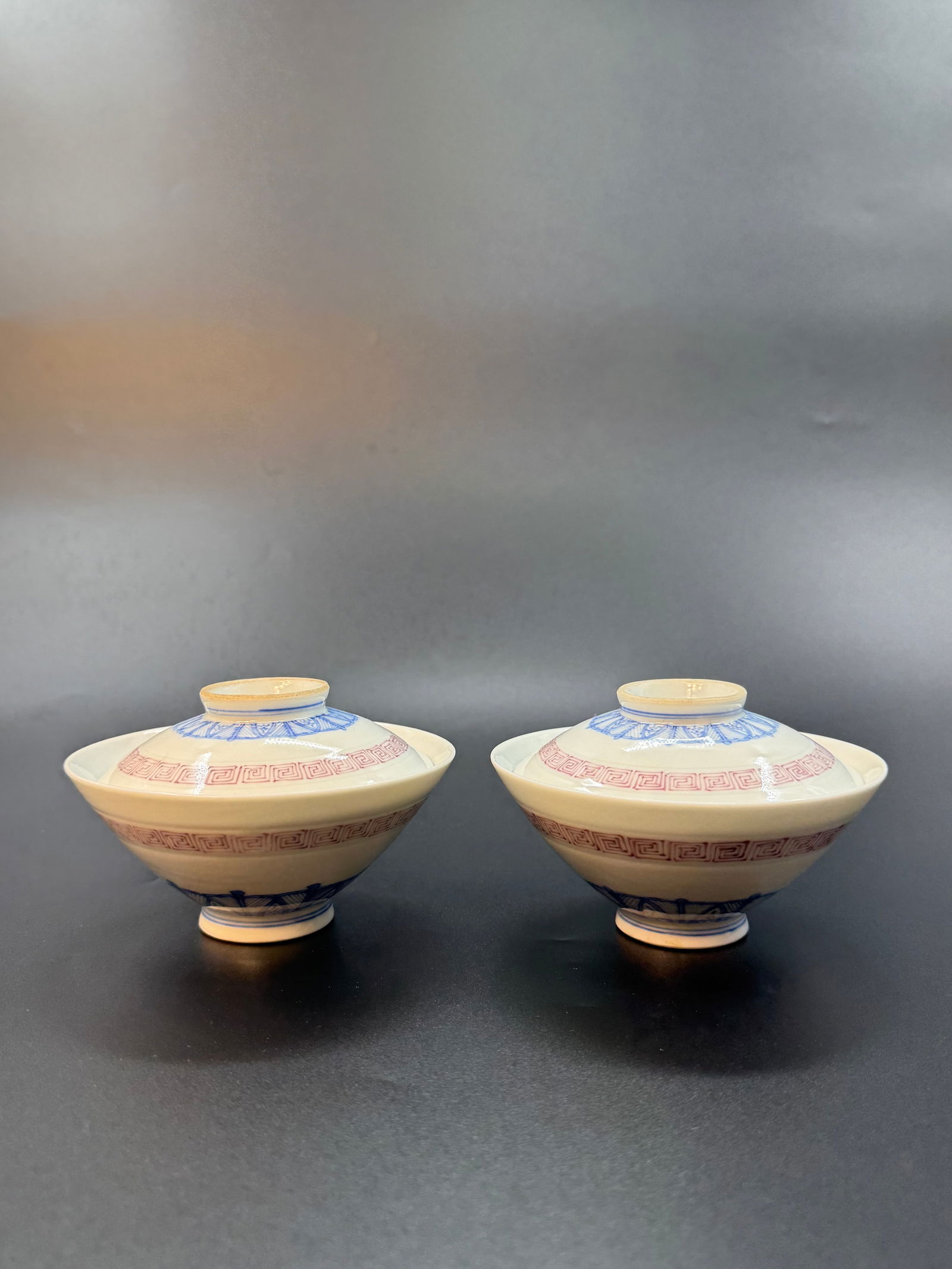 A pair of blue and white tea cup: 20th Century, D: 11.5cm