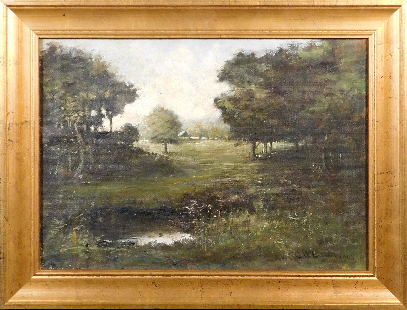 C.W. Ladd: Early 20th Century Spring Landscape: C.W. Ladd: Early 20th Century Spring Landscape. Oil on canvas signed "C W Ladd, 1902" lower right, framed. 13x17 inches framed; 10x14 inches canvas. Fair aged condition, minor paint loss. A small hole
