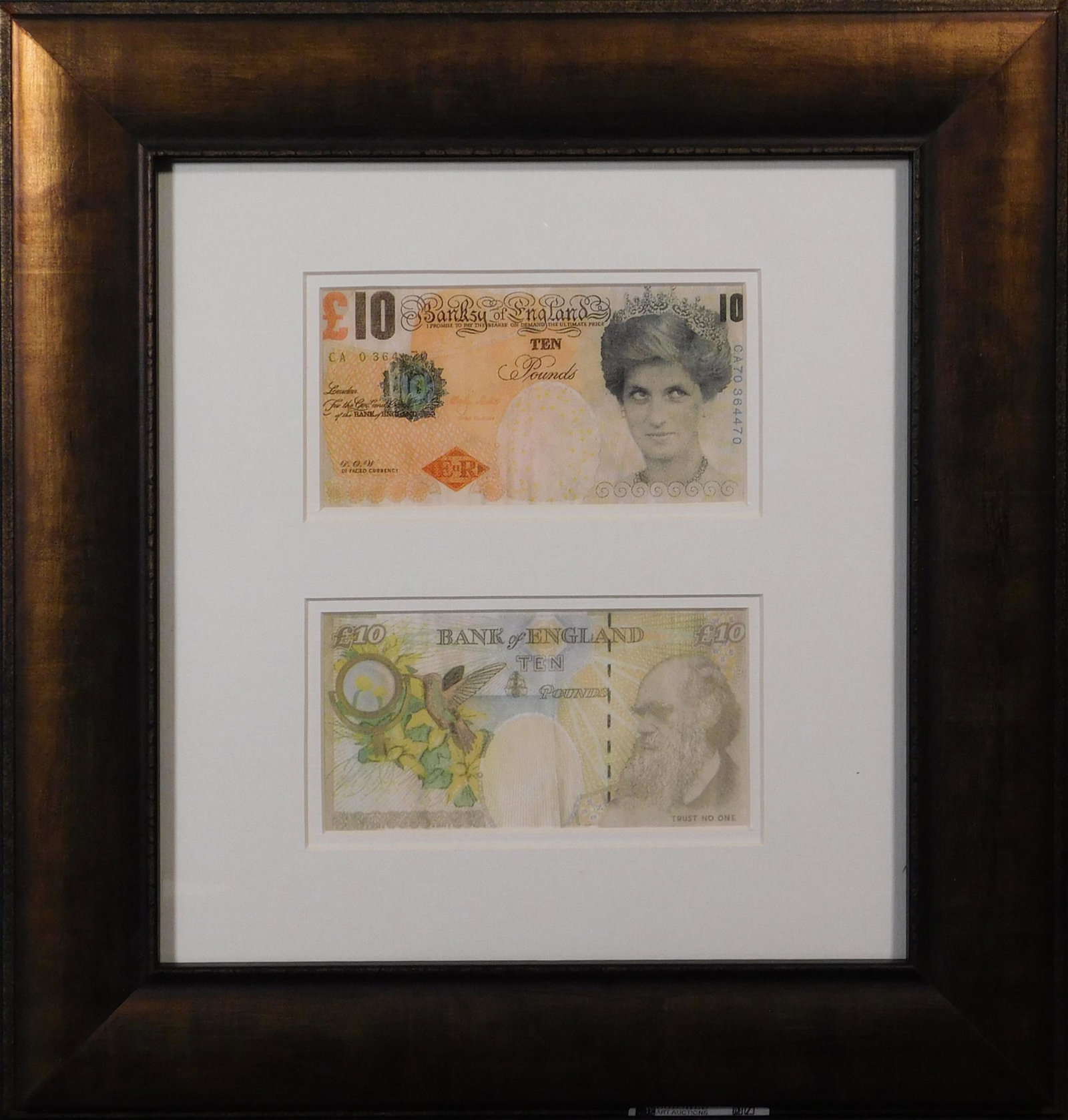 Banksy (After): Two Difaced Tenners: Banksy (British, b. 1974) (After): Two Difaced Tenners, digital prints, framed with glass front and back, unsigned. In 2004, Banksy printed 1 million pounds worth of fake 10 pound notes that replaced 