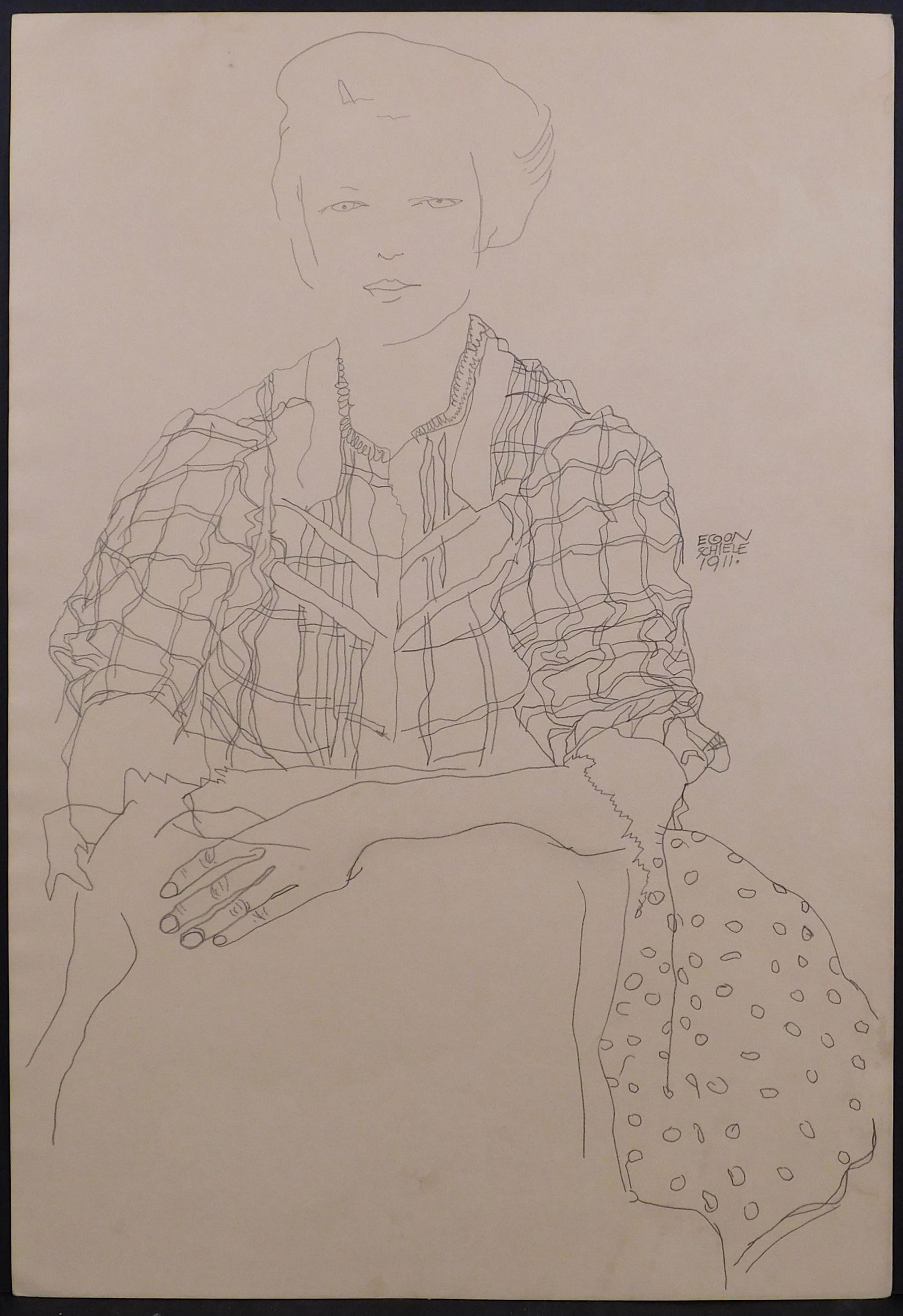 After Egon Schiele: Madchen mit karierter Bluse (Girl: After Egon Schiele (Austrian, 1890-1918) : Madchen mit karierter Bluse (Girl in checkered blouse). Pencil on paper, signed and dated (1911) in the center. Compared to the highly charged and shockingly