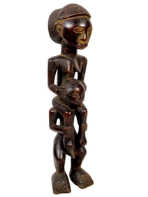 Figure of a Woman on the Shoulders of a Man, Tabwa, Zaire