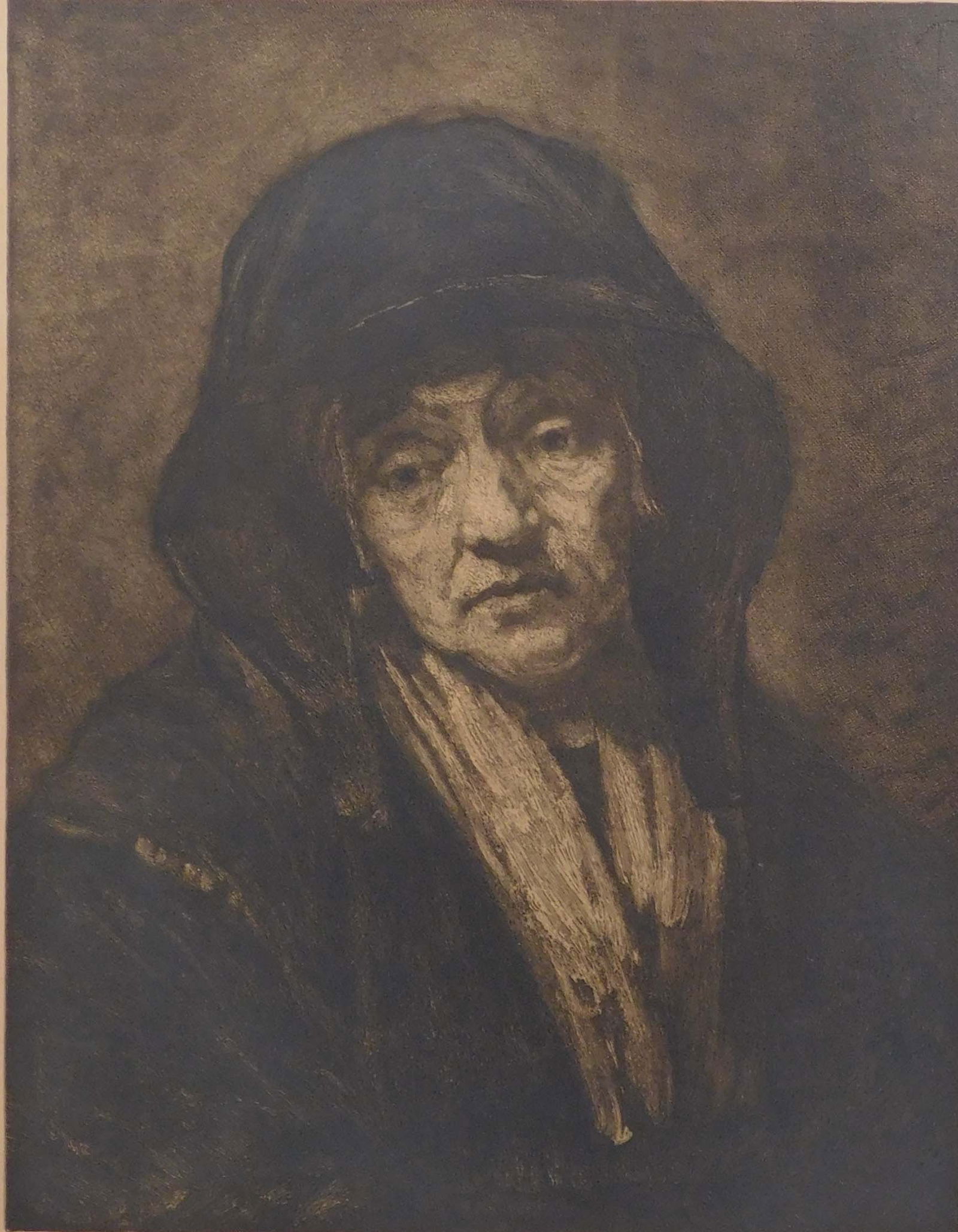 After Rembrandt van Rijn: Old Woman in a Chair: After Rembrandt (Dutch, 1606-1669): Old Woman in a Chair, Early 20th Century. Steel engraving on paper mounted to carboard, framed. Rembrandt Harmenszoon van Rijn, usually simply known as Rembrandt, w