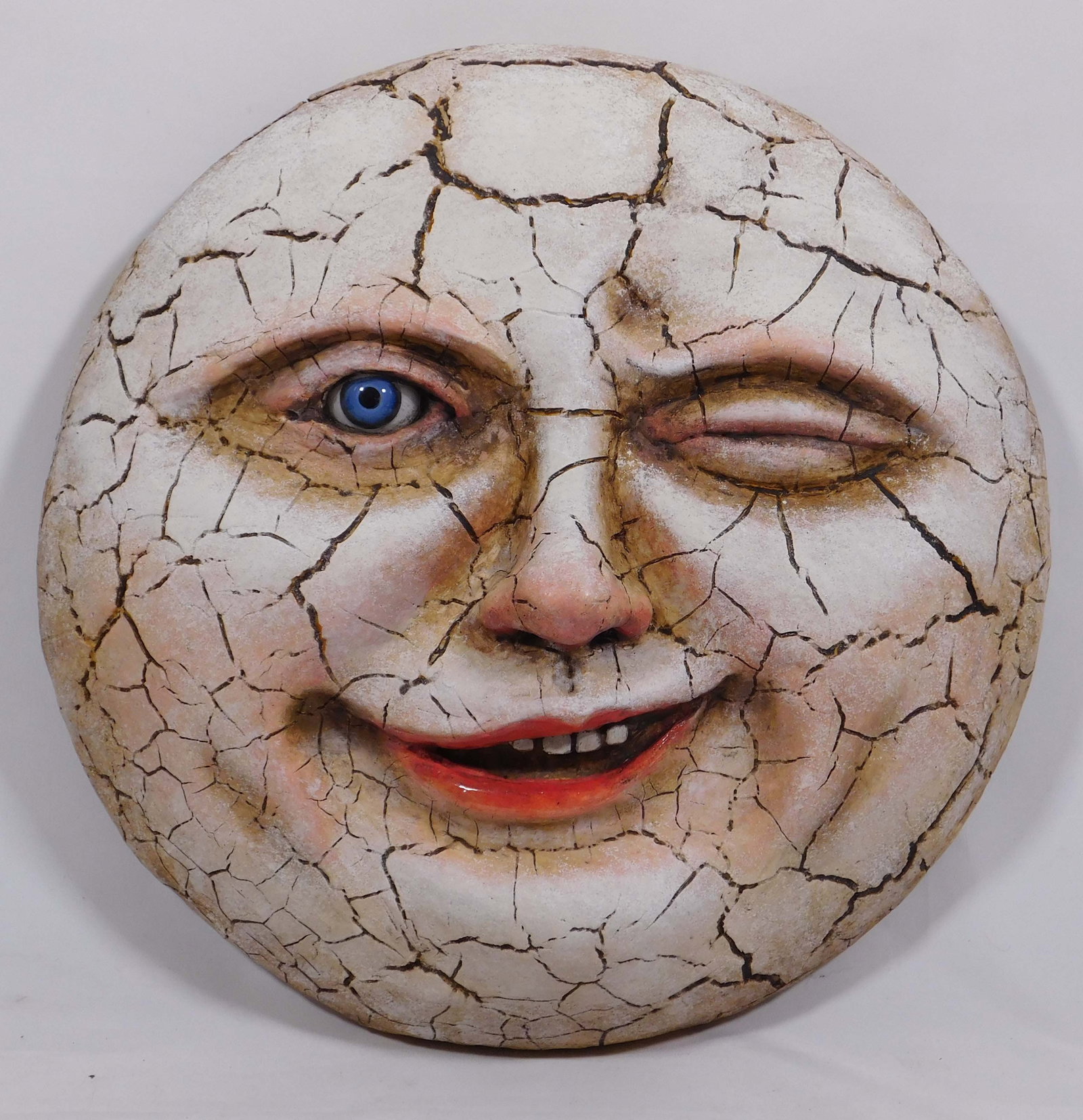 Vergie Lightfoot: Laughing Crackle Moon: Vergie Lightfoot (American, 20th Century): Laughing Crackle Moon, 2022. Mixed media sculpture, signed verso. Vergie Lightfoot's original designs include a menagerie of playful and scary cats, a crop