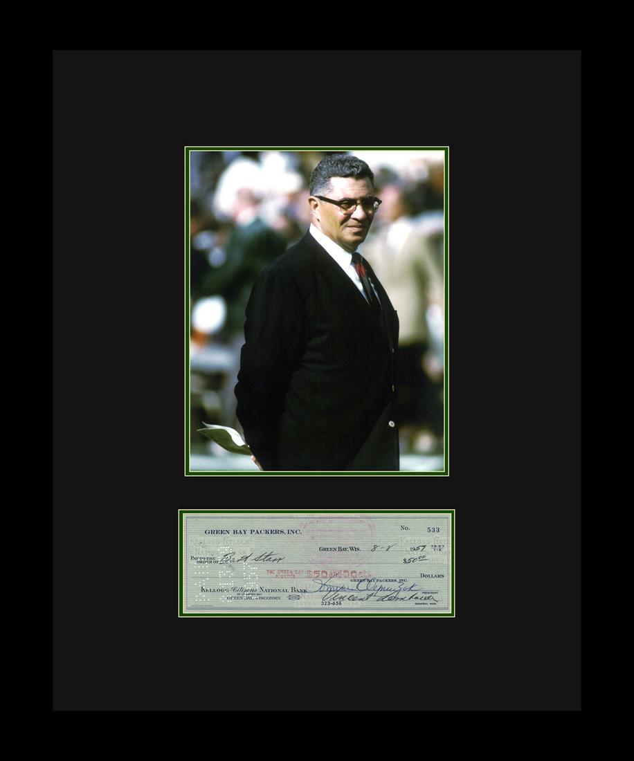 Vince Lombardi with Reproduction Check: An archival photograph entitled "Vince Lombardi." Lombardi is best known as the head coach of the Green Bay Packers during the 1960's. Includes a reproduction of a personal check signed by Vince Lomba