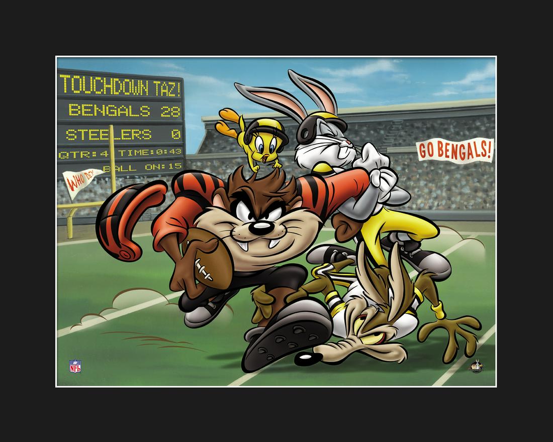 Cincinnati Bengals and Taz -Warner Bros. Lithograph: A Warner Bros. lithograph entitiled " Touch Down Taz " featuring Taz as a Benglas player busting through the defense - Wile E Coyote, and Bugs Bunny. Licensed. Comes Matted with a certificate of authe