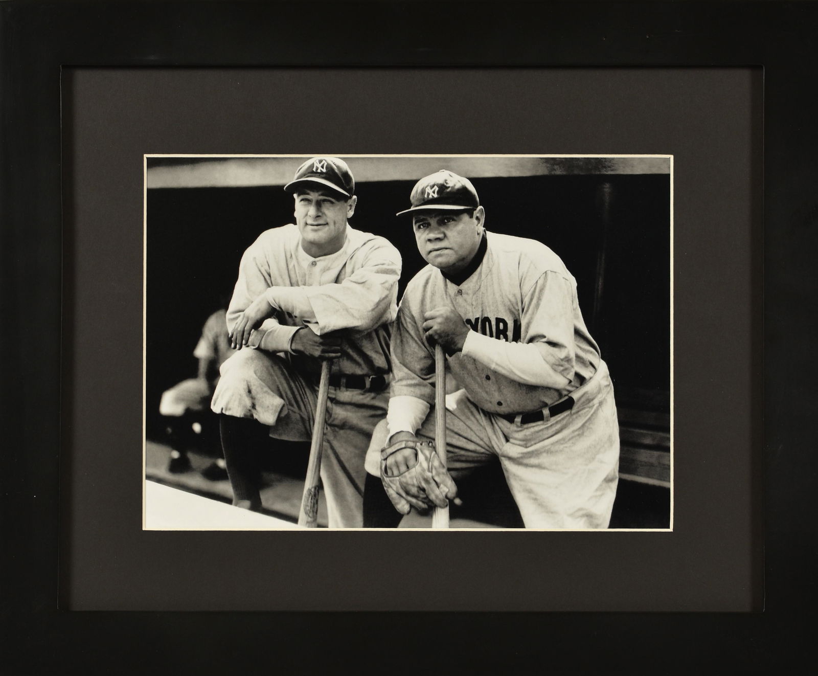 Babe Ruth and Lou Gehrig -Framed-Dugout: This framed 11x14 lithograph features baseball great - Babe Ruth and Lou Gehrig coming out of the dugout! This piece is matted and framed -comes with COA
