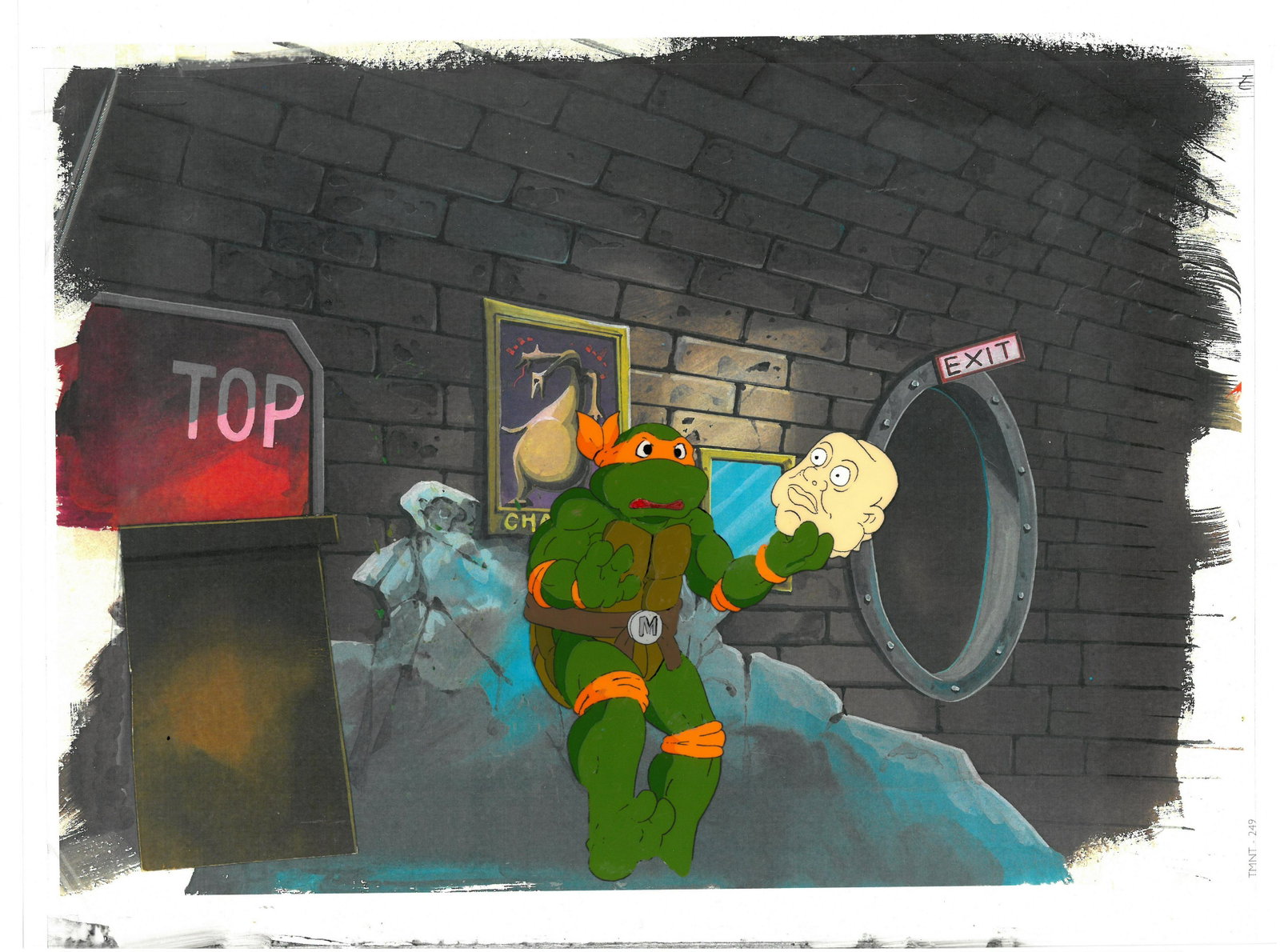 Michelangelo of (TMNT) Turtles- Original Production Cel: An original Teenage Mutant Ninja Turtle production cel. This cel depicts a frame from a scene in a Teenage Mutant Ninja Turtles cartoon episode. This frame features Michelangelo . Is produced by Murak