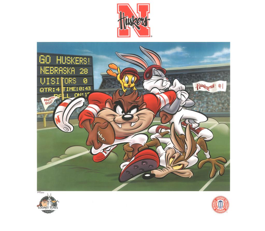 Nebraska Huskers - Warner Bros. Lithograph: This limited edition lithograph entitled "Husker Taz" was created especially for the University of Nebraska Husker Fans! Licensed by Warner Bros. and the Collegiate Licensing Company. 19 x 22.5 - come