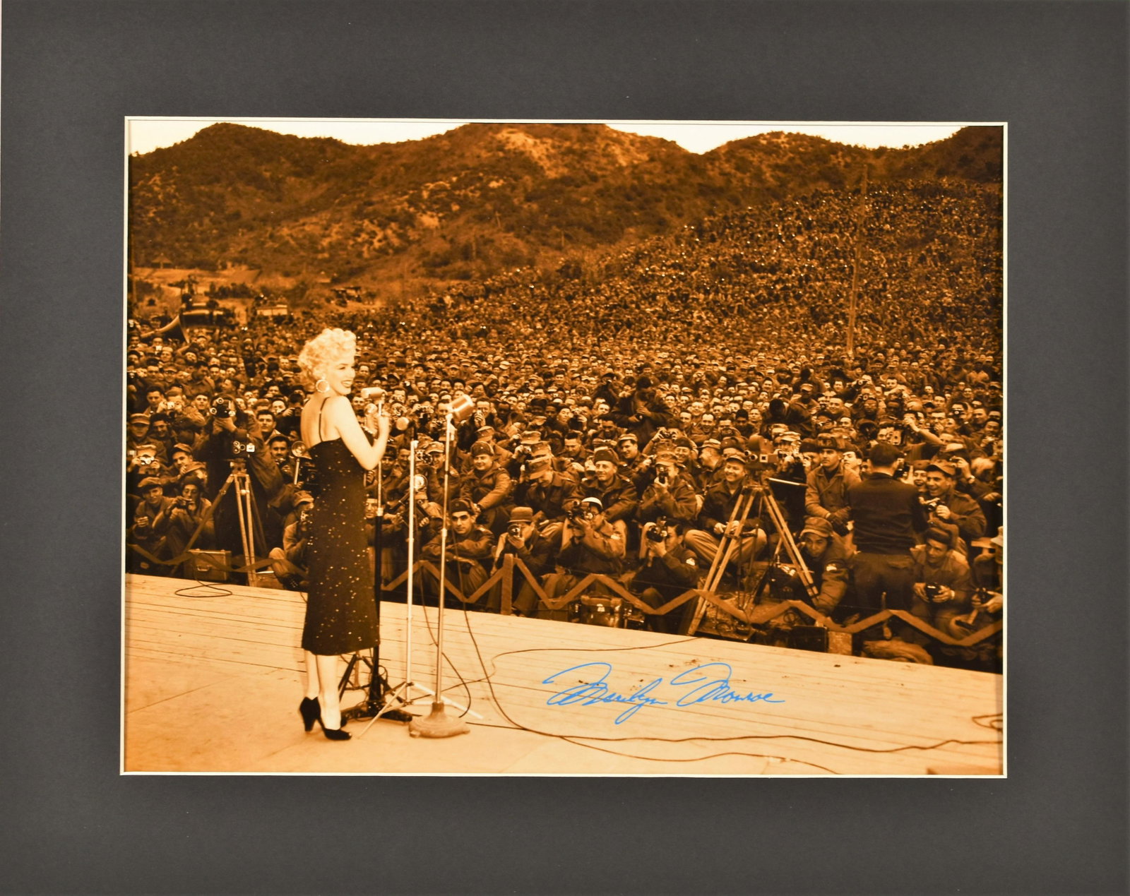 Marilyn Monroe Troops - Fuji Crystal Archival: An fuji crystal archival photograph entitled "Marilyn Monroe Sings for the Troops." This vintage photograph of Marilyn Monroe entertaining the troops in Korea, was photographed on February 18, 1954. F