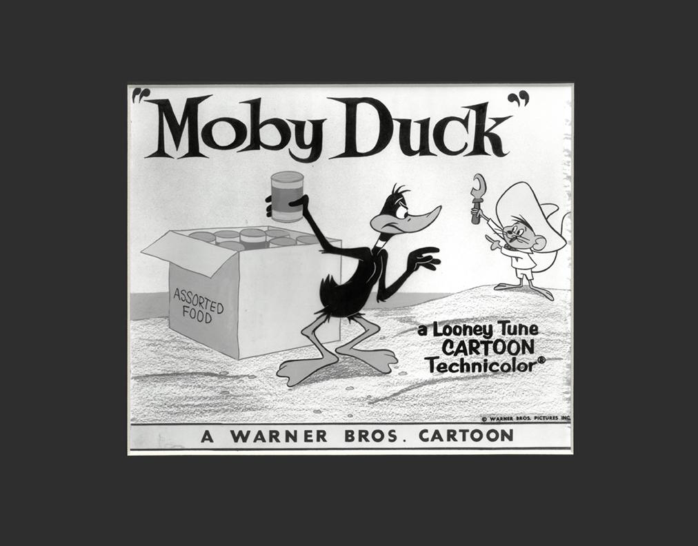 Daffy Duck and Speedy Gonazales - Moby Duck - Lobby: A Warner Bros. Looney Tune Lobby Card entitled "Moby Duck." Moby Duck is a technicolor cartoon, directed by Robert McKimson. â€œMoby Duck” was released in 1965 and features Daffy Duck and Sp