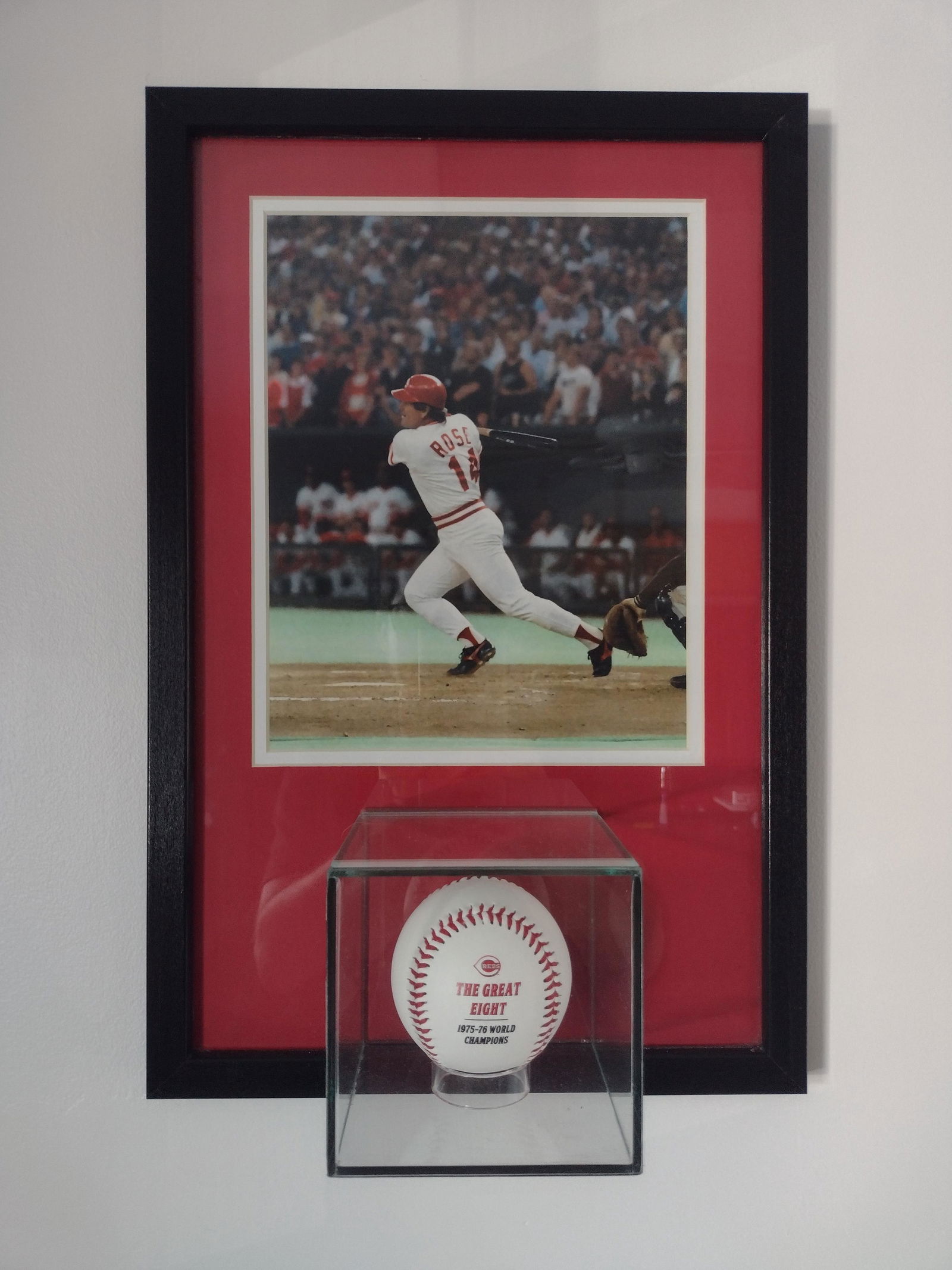 Cincinnati Reds - Pete Rose "The Great Eight" Ball - Framed: This unique one-of-a-kind framed display features a photo of Pete Rose with a Cincinnati Reds Logo Ball with the title " The Great Eight. " The 1075-76 Cincinnati Reds team were known as the Big Red M
