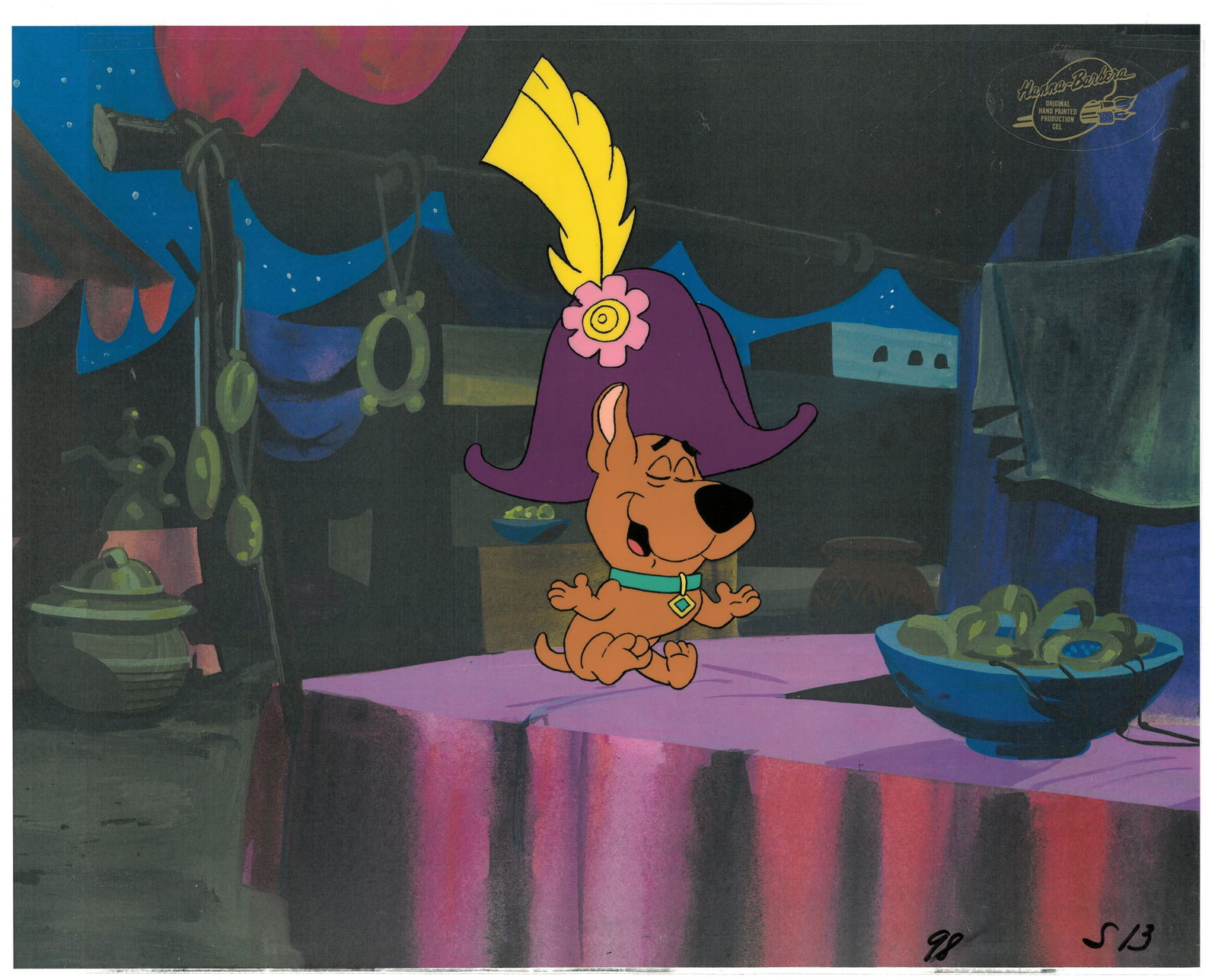 Scrappy Production Cel from Scooby-Doo - 13 Ghosts- HB Seal: An original production cel with Hanna-Barbera Seal from " The Thirteen Ghosts of Scooby-Doo" registered to a lithograph background with Hanna-Barbera Seal. Featured on acetate is the character Scrappy