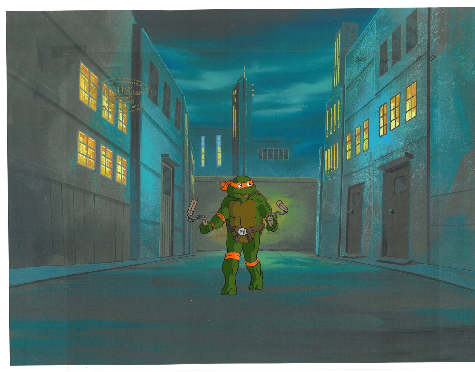 Michelangelo of (TMNT) Turtles- Original Production Cel with Official MWS Seal: An original Teenage Mutant Ninja Turtle production cel with official MWS Seal. This cel depicts a frame from a scene in a Teenage Mutant Ninja Turtles cartoon episode. This frame features Michelangelo