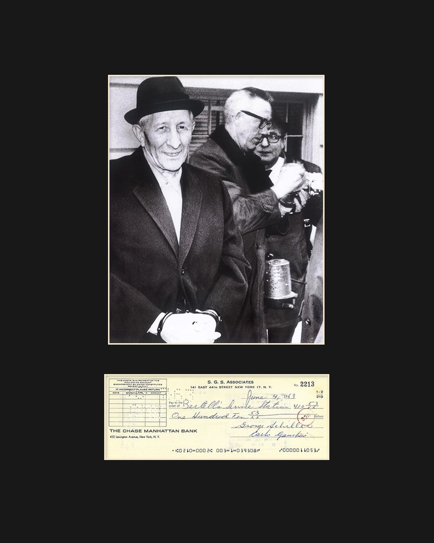 Carlo Gambino Matted Photo with Reproduction Check-16x20: This archival photograph entitled " Gambino " features a photo of Carlo"Don Carlo" Gambino. Gambino was a Sicilian-American mobster and boss of the Gambino crime family. Also featured is a reproductio