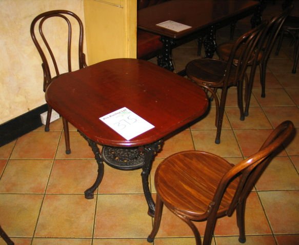 TABLE AND CHAIRS: Mahogany solid top dining table with cast iron base 780mm x 700 with 2 x spindle back wooden chairs