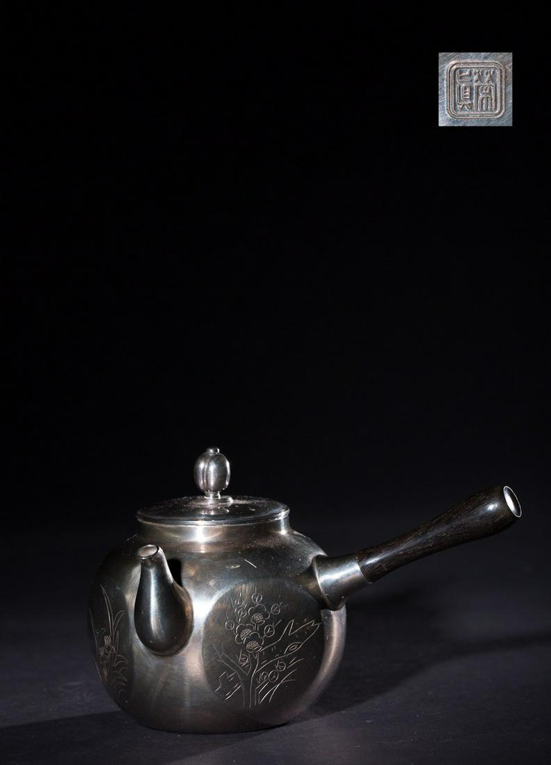JAPANESE SILVER TEAPOT: Length: 5.5 inches. Width: 3.9 inches. Height: 3.5 inches. Length: 14cm Width: 10cm Height: 9cm Weight: 156g Provenance: From the collections of Mr. Matsuda from New Jersey.