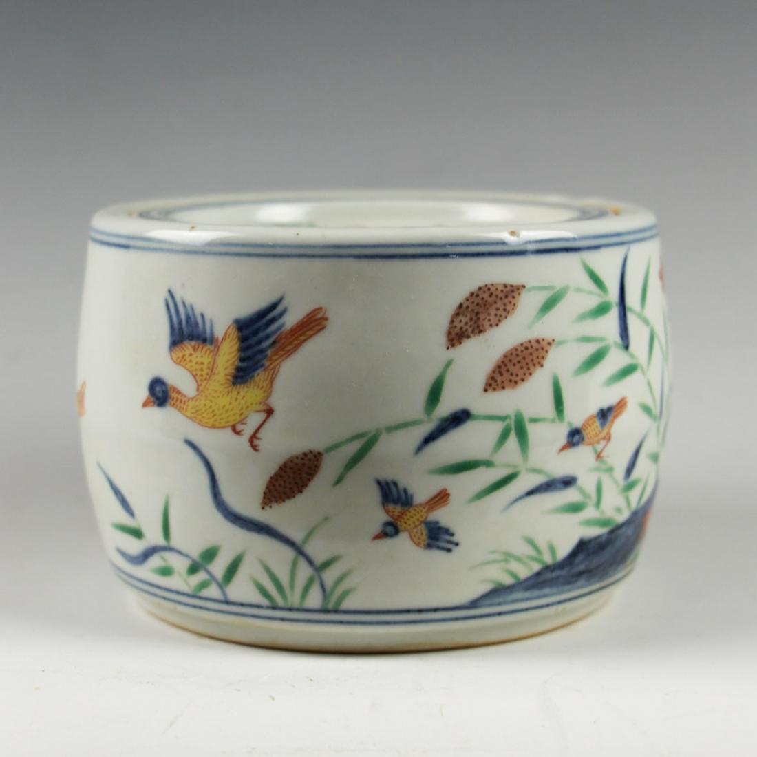 CHINESE DOUCAI PORCELAIN CRICKET JAR: Mouth diameter: 5.3 inches. Height: 3.5 inches. Mouth diameter: 13.5cm Height: 9cm. Provenance: From the collections of Mr. Ross from New York.