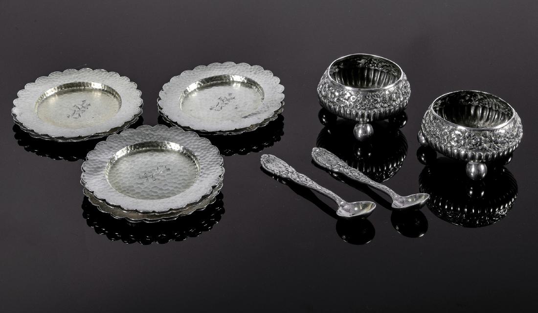 Tiffany & Co. salt cellars, spoons, plates: Tiffany & Co. pair Chrysanthemum salt cellars and salt spoons, c. 1870-1874 with a set of ten butter plates, c. 1881 New York, NY sterling silver, hammered sterling silver impressed hallmarks plate: 3