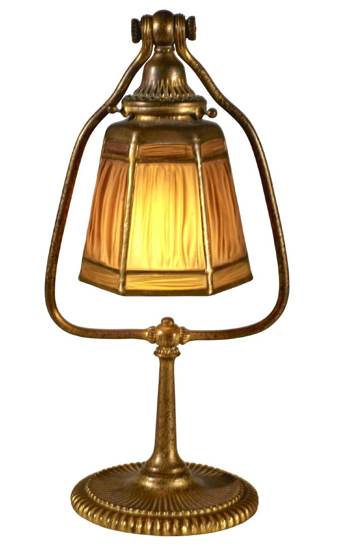 Tiffany Studios Linenfold lamp: Tiffany Studios Linenfold lamp New York, NY Favrile glass, bronze shade and base signed 15"h x 7"w