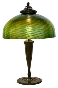 Tiffany Studios desk lamp: Tiffany Studiosdesk lampNew York, NYbronze, Favrile glasssigned18.5"h x 12"dia