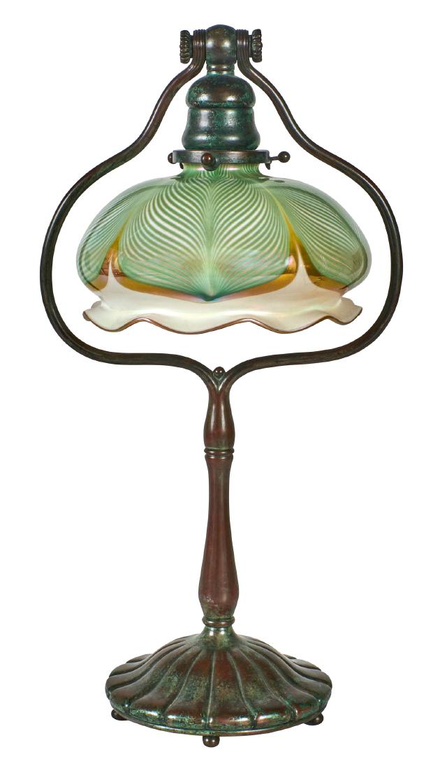 Tiffany Studios desk lamp: Tiffany Studios desk lamp New York, NY glass, bronze base and shade signed, Quezal shade 17.5"h x 9.5"w