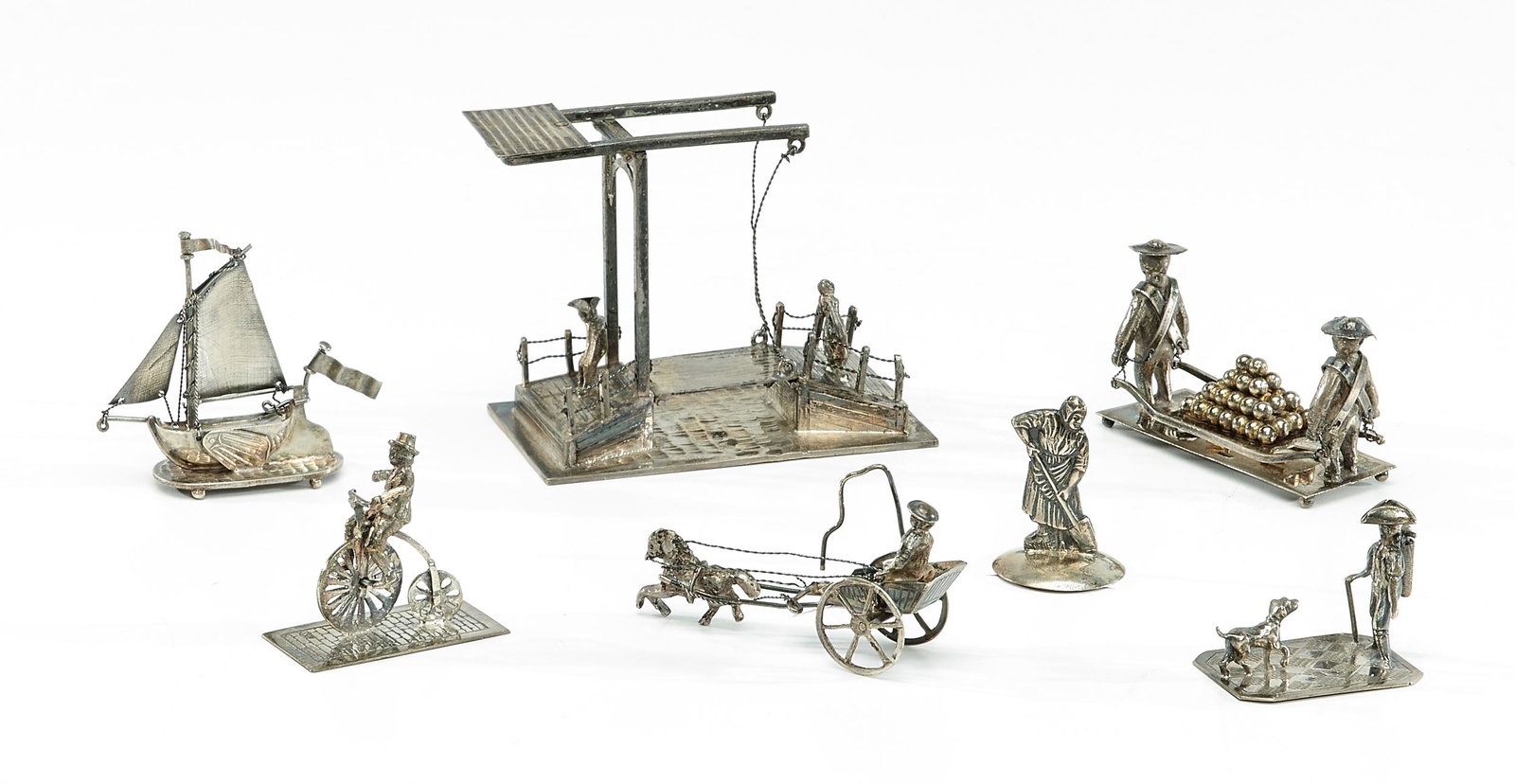 Sterling silver figural miniatures, Asian, group of: Sterling silverfigural miniatures, group of sevenAsian, attributionsterling silverimpressed hallmarkstallest: 2.5"h x 3.25"l x 1.75"w