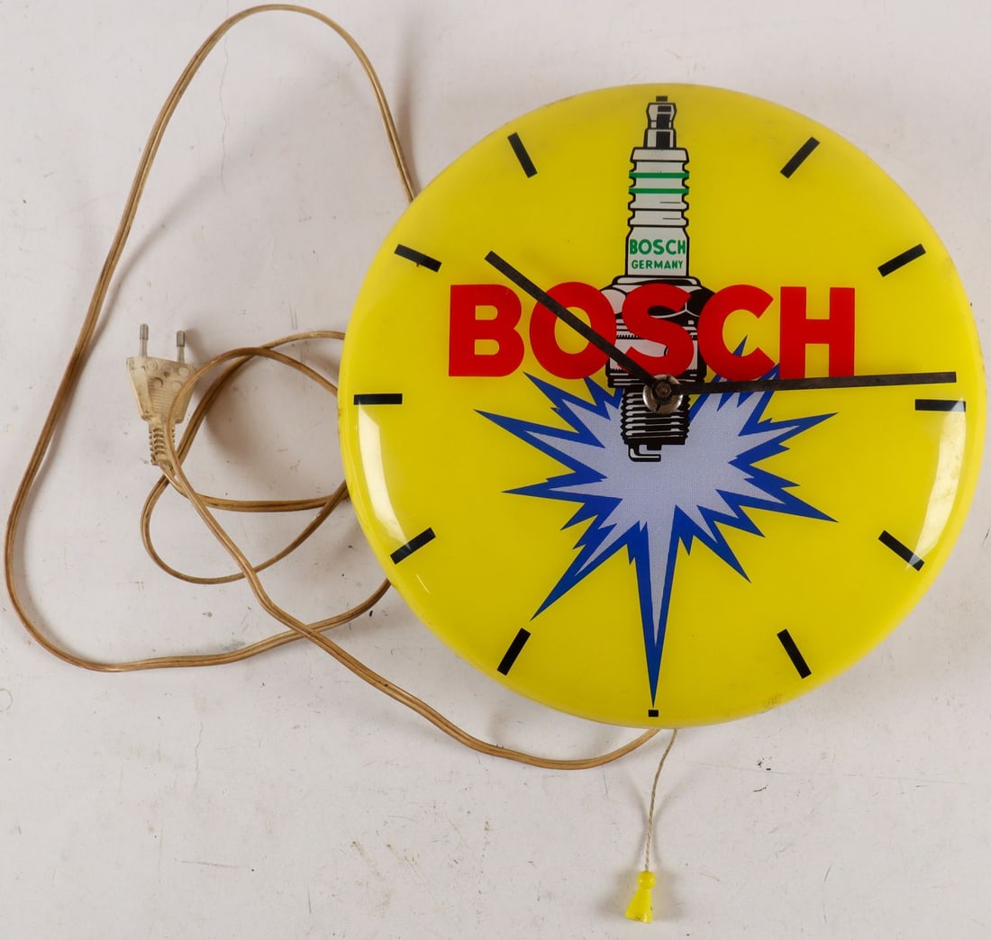 Automobilia Bosch spark plugs wall clock with light from th: D: 31 cm