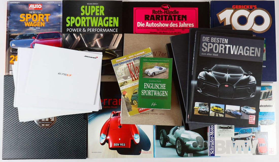 Automobilia 21-piece sales catalogs and books from the 90s/ (1 of 1)