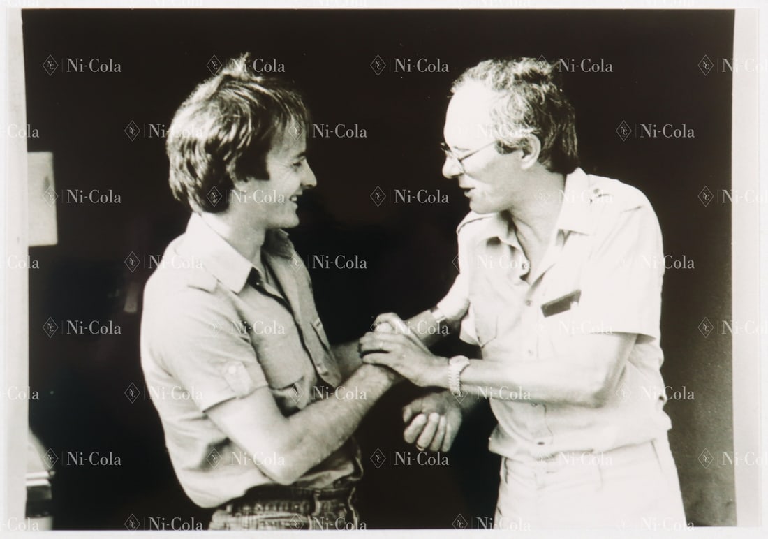 Ferrari Estate of the former racing director of Scuderia Fe: Original B/W negative and B/W press photo (new print) Gilles Villeneuve and Nosetto in conversation early 1980s