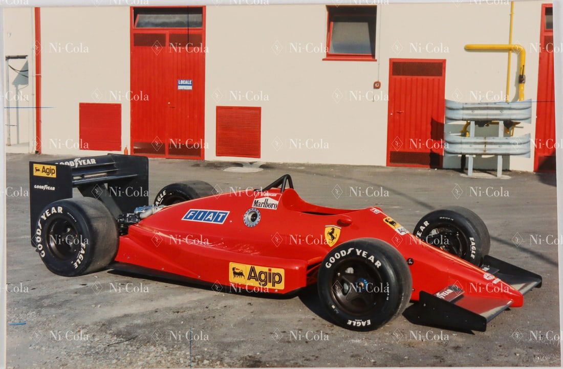 Ferrari Original Color - Press Photo Type 637 Indycar from: The completed car stands in the factory, 23 x 15 cm, with embossed stamp: 'Foto Parenti', rare