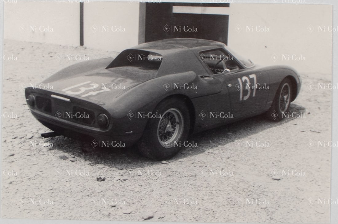 Ferrari Original B/W - Press photo Type 250 LM s/n 5909 in: Showing the car after preparations for its first race at the Nürburgring, 18 x 13 cm, stamped: Foto Coltrin