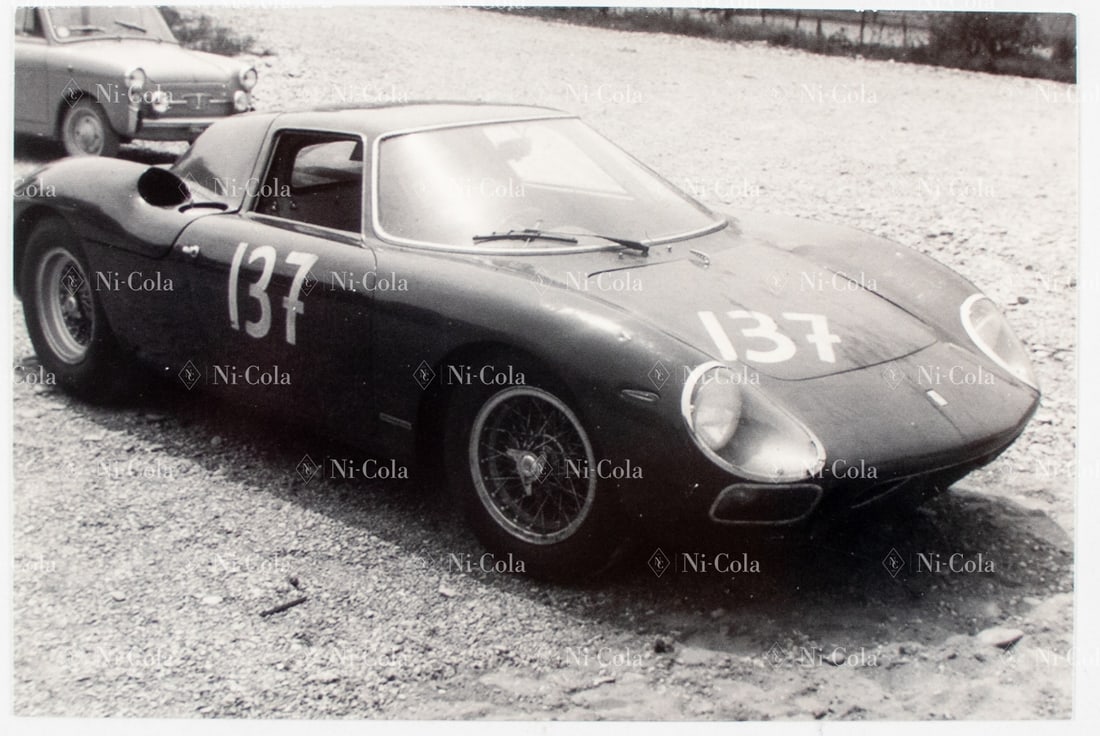Ferrari Original B/W - Press photo Type 250 LM s/n 5909 in: Showing the car after preparations for its first race at the Nürburgring, 18 x 13 cm, stamped: Foto Coltrin