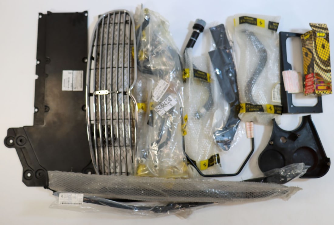 Ferrari 16-piece NOS spare parts for models from the 80s to: Part numbers: 82955800, 94084330, 241085, 66463800, 61486600 etc., partially in original packaging