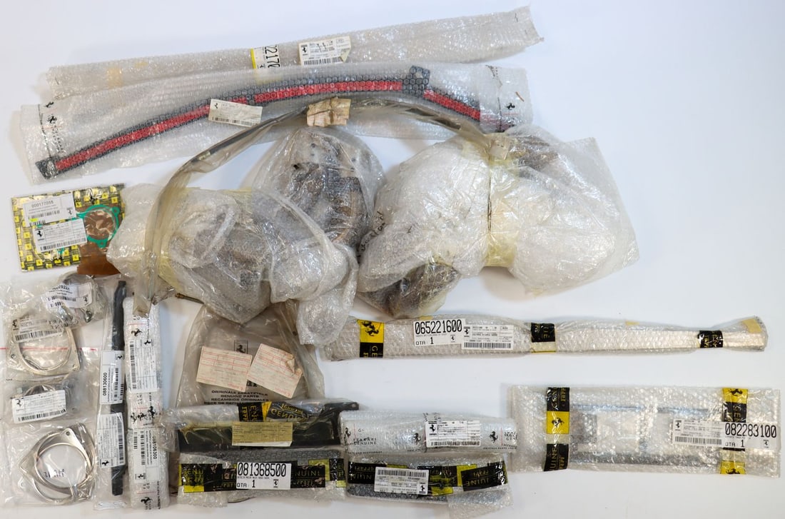 Ferrari 20-piece Spare Parts NOS from the 90s to 2010s: Part numbers: 156123, 88106300, 82283100, 65221700, 67740000, 81368500 etc., each in original packaging