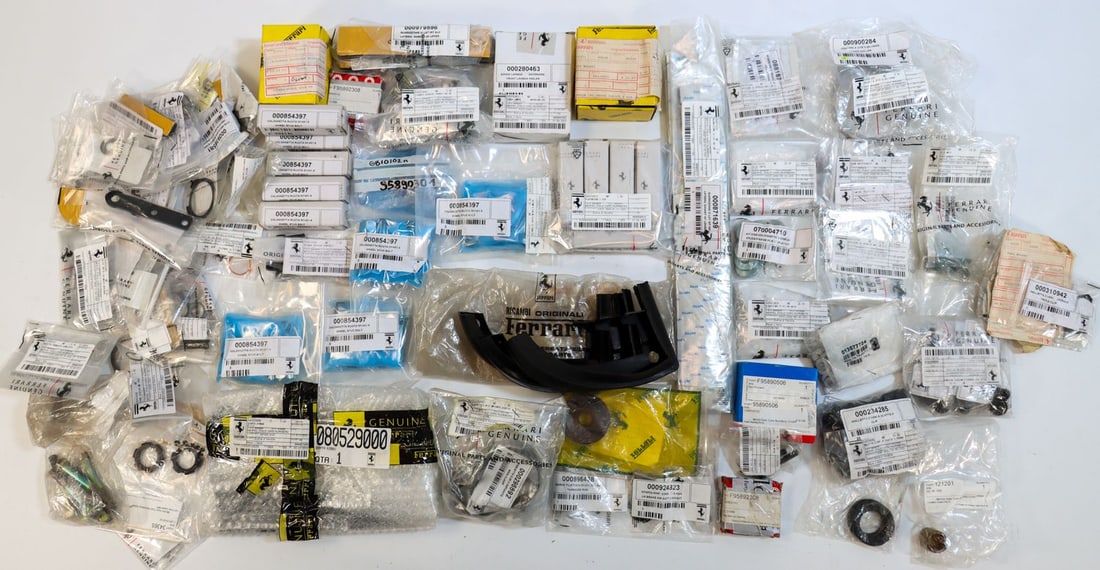 Ferrari 82-piece NOS spare parts for models from the 80s to: Part numbers: 234285, 296892, 318013, 280463, 95890506, 766266, 80529000, 88187400, 162462, 871639, 897537, 95880819, 854397, 64923021, 820060, 147816 etc., each in original packaging